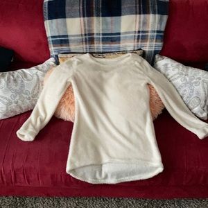 medium fuzzy sweater, somewhat thin